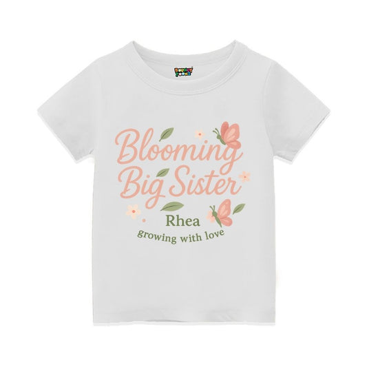 'Blooming Big Sister' and Growing with Love text, with floral and butterfly design printed, White t-shirt.