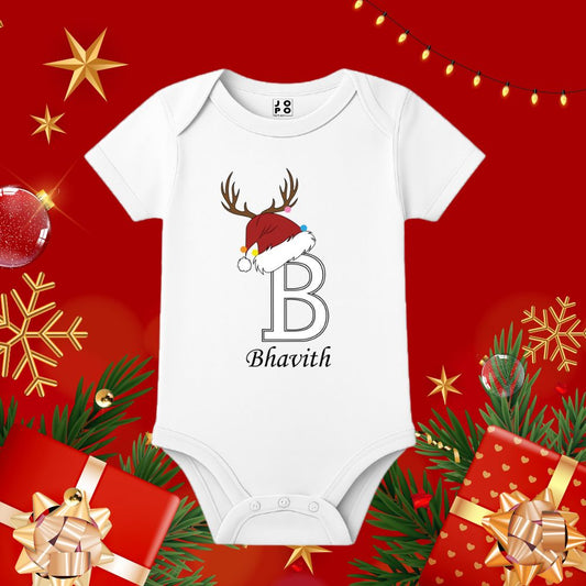 White baby onesie with a Christmas hat and Reindeer design