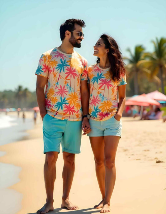 A couple matching floral t-shirts in pink, yellow, and green color