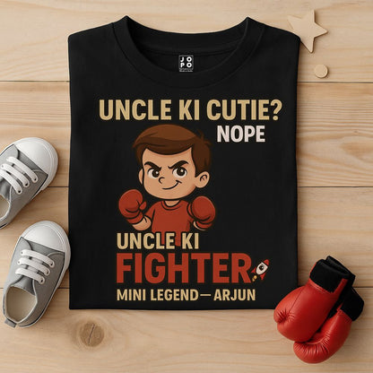 Black t-shirt with a boy cartoon character and Mini Legend text design