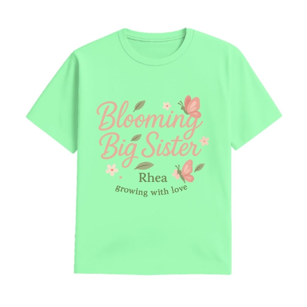 'Blooming Big Sister' and Growing with Love text, with floral and butterfly design printed, Mintgreen t-shirt.