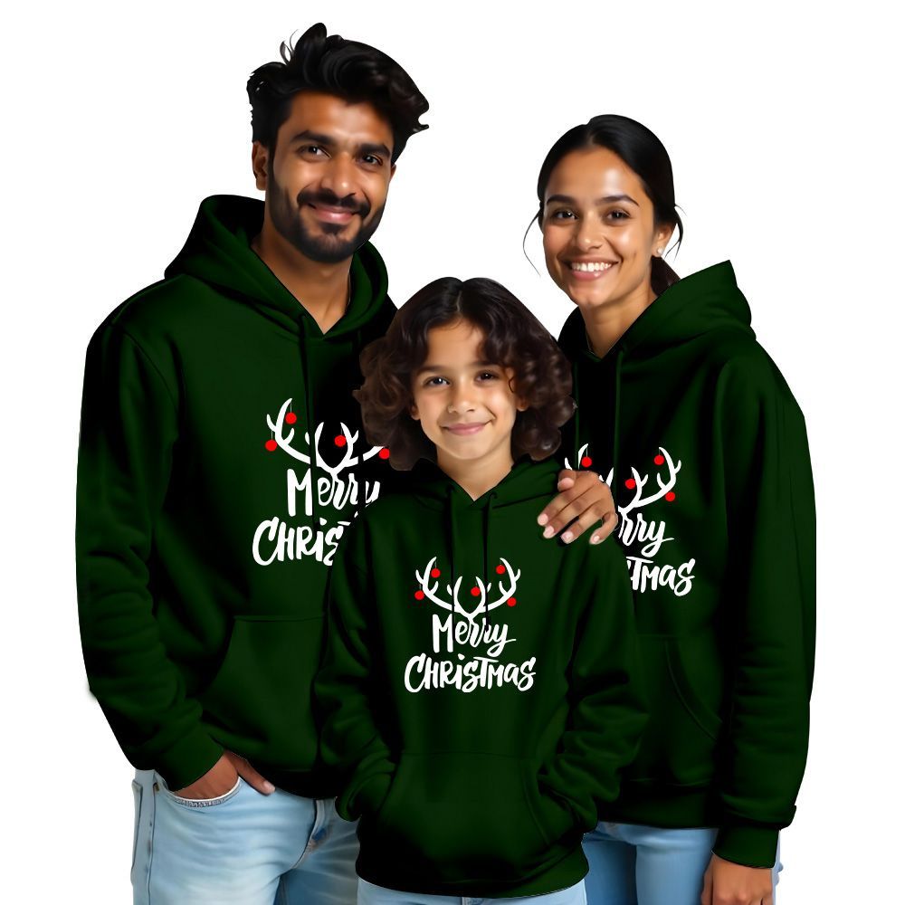 Bottlegreen Family of three wearing white hoodies with 'Merry Christmas' text 