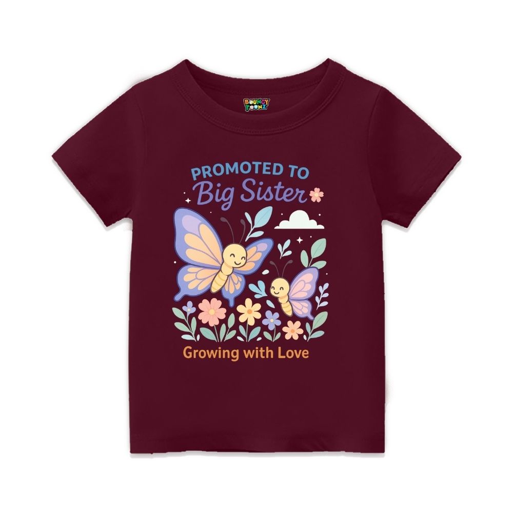 Maroon t-shirt with butterfly design and text 'Promoted to Big Sister Growing with Love' 