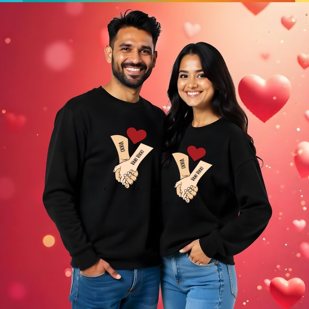 Matching black blue sweatshirts with a heart and hand design