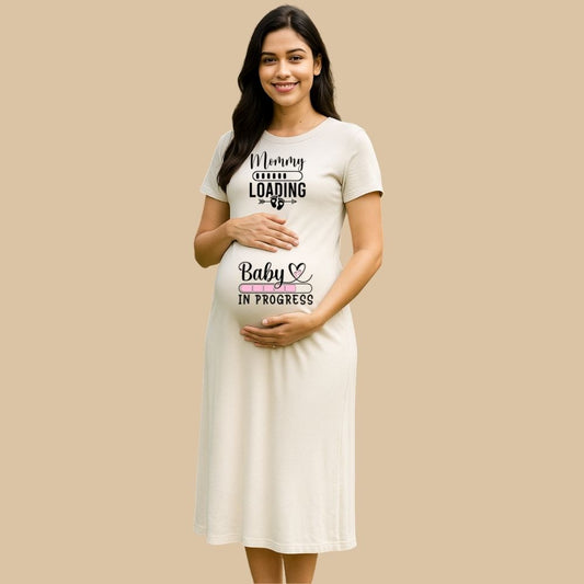 Maternity white dress with 'Baby in Progress and Mommy Loading' text 