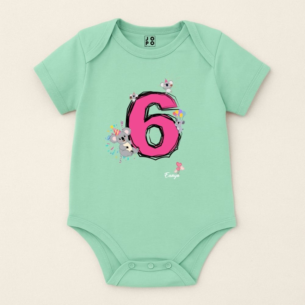 Mint green baby onesie with pink number 6 and floral