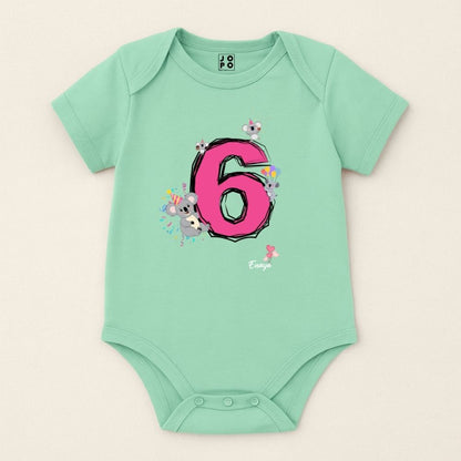 Mint green baby onesie with pink number 6 and floral