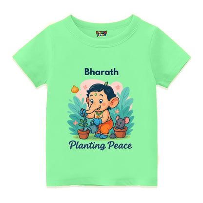 Mintgreen Kids t-shirt with text 'Planting Peace' 