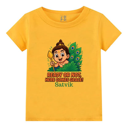 Mustard t-shirt, Balamurugan with vel and feather design and text  'Ready or Not, Here Comes Grace'! 