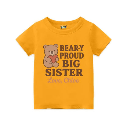 Mustard t-shirt with a bear graphic and text