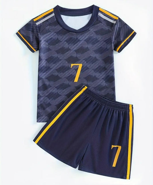 A soccer jersey and shorts set for kids, with number