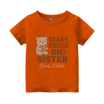 Orange t-shirt with a bear graphic and text