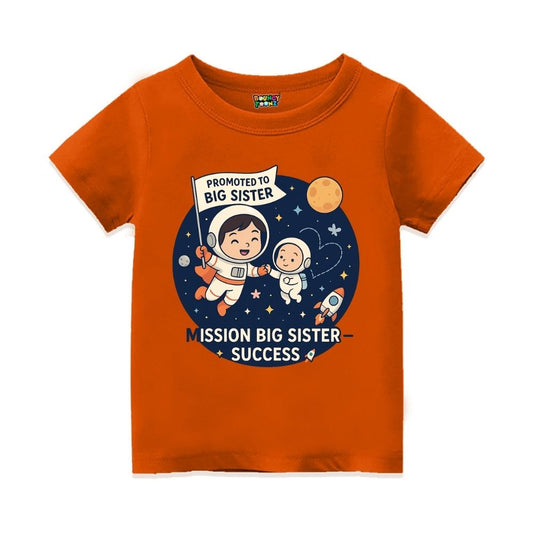 Orange t-shirt with space-themed design and text 'Promoted to Big Sister' 