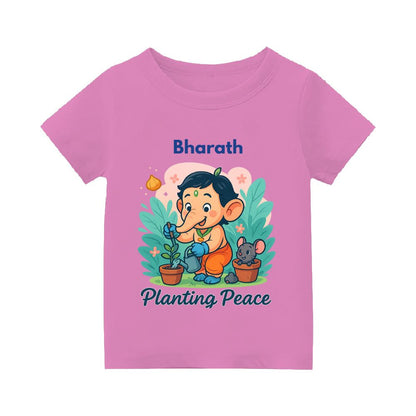 Pink Kids t-shirt with text 'Planting Peace' 