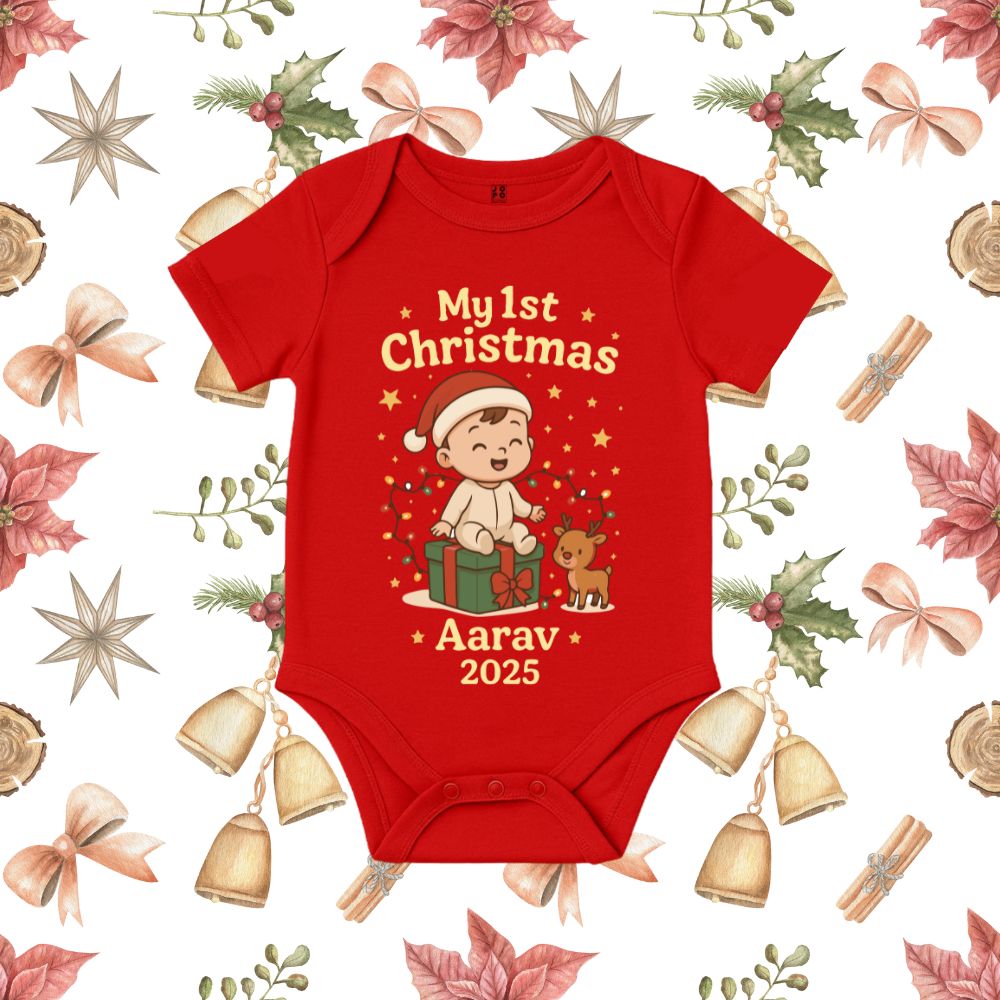 Red baby onesie with Christmas design and text 