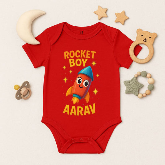 Red baby onesie with a rocket design and text