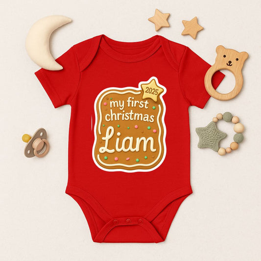Red baby onesie with 'my first Christmas 2025' design