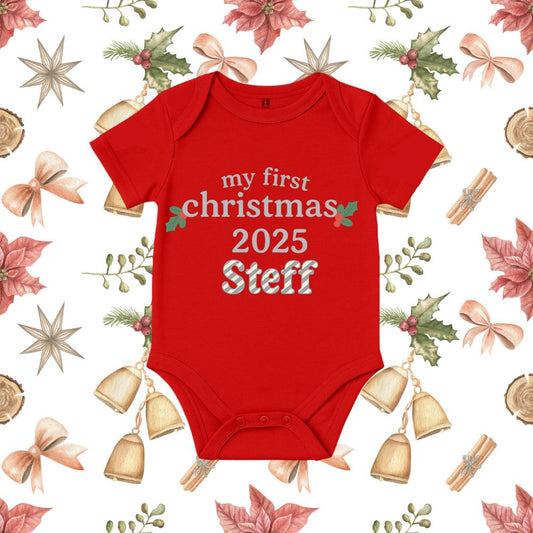 Red baby onesie with 'my first christmas 2025 ' text with chritmas motifs