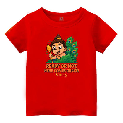 Red t-shirt, Balamurugan with vel and feather design and text  'Ready or Not, Here Comes Grace'! 