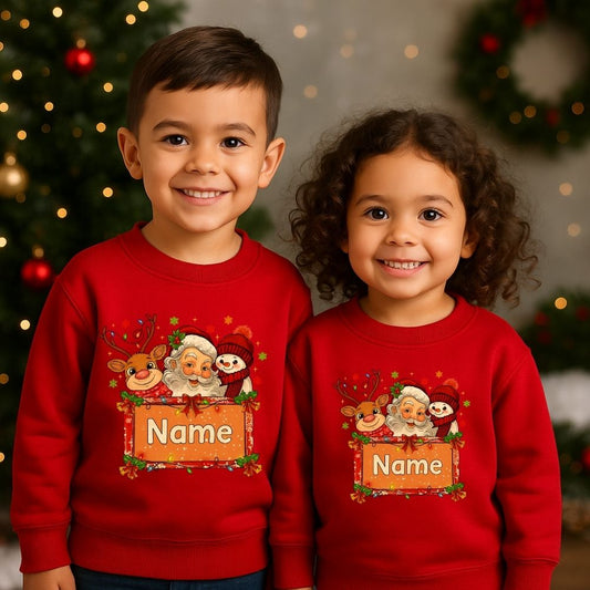 Two children wearing Red Christmas sweatshirt with Santa Claus designs 