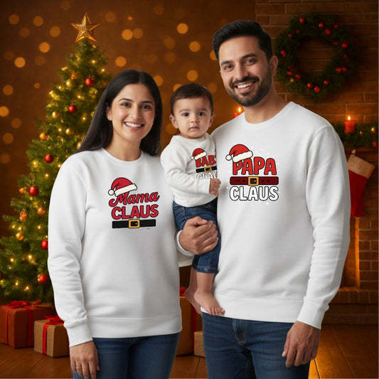 White Family of three wearing matching 'Mama Claus', 'Papa Claus', and a child's Sweatshirt 