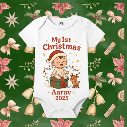 White baby onesie with Christmas design and text 