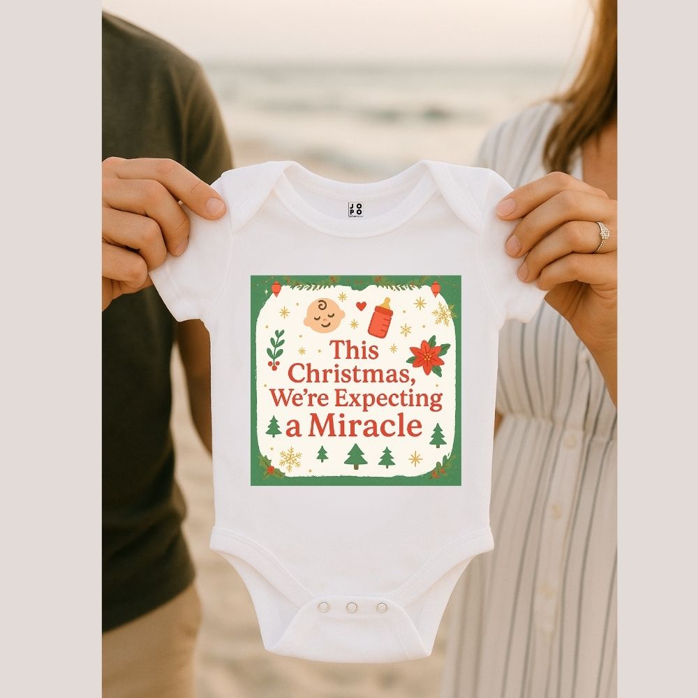 White baby onesie with "Thsi Christmas, We're Expecting a Miracle" text and feeding bottle and baby graphic design.