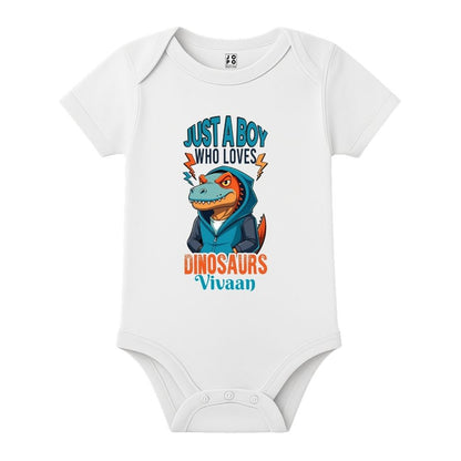 White baby onesie with a dinosaur graphic and text 