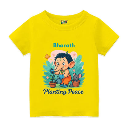 Yellow Kids t-shirt with text 'Planting Peace'