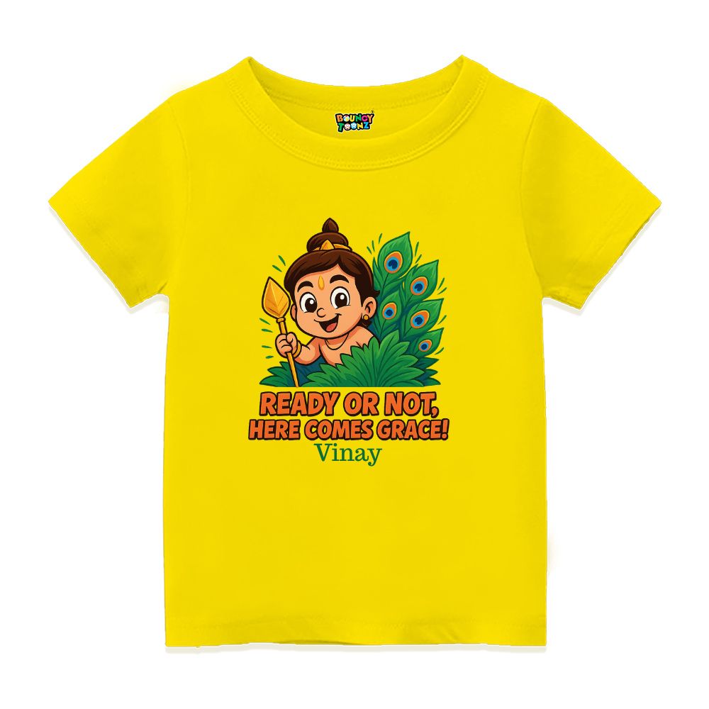 Yellow t-shirt, Balamurugan with vel and feather design and text  'Ready or Not, Here Comes Grace'! 