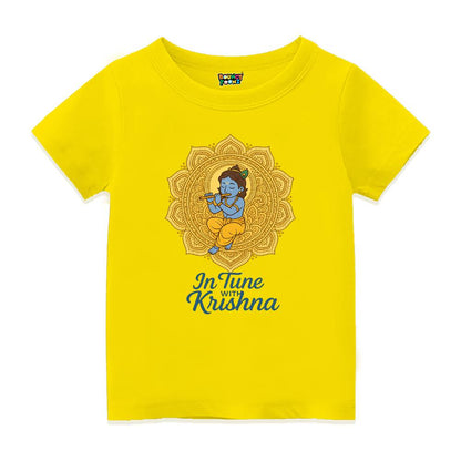 Yellow t-shirt with a mandala design and 'In Tune with Krishna' text 