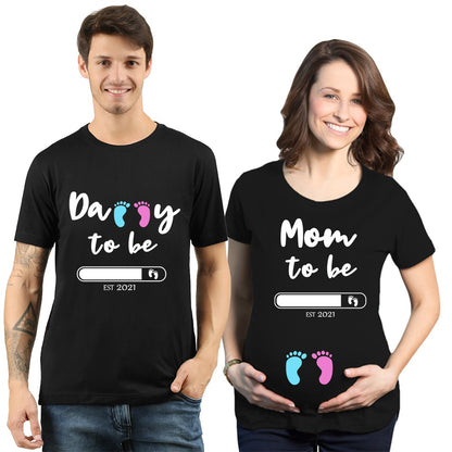 Maternity Couple matching black T-shirts with the text 'Daddy to be' and 'Mommy to be' along with a footprint design.